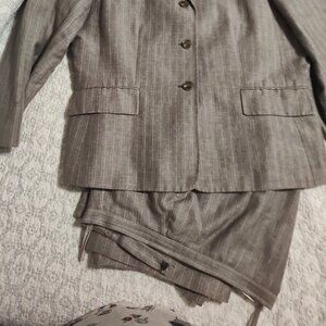 A light brown 2 piece pant suit